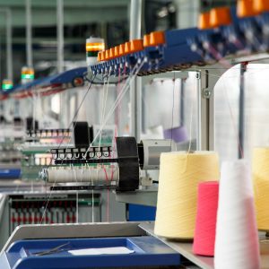 Textile industry with knitting machines in factory